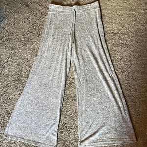 Grey sweatpants with flair at the bottom